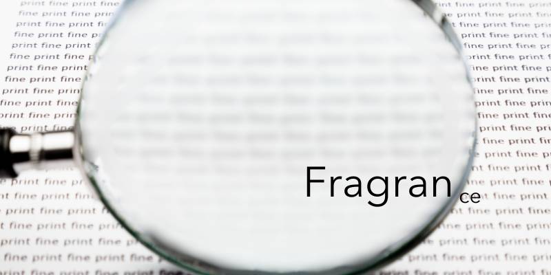 magnifying glass on the word fragrance