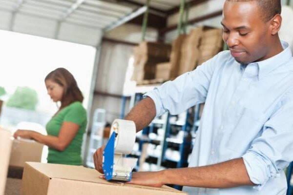 employees putting parts of orders together to ship during kitting services