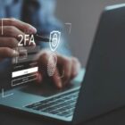 man making a payment on his laptop that is requiring 2 factor authentication to prevent fraud